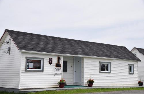 Cap-des-Rosiers Hotel | Les Cabines sur Mer