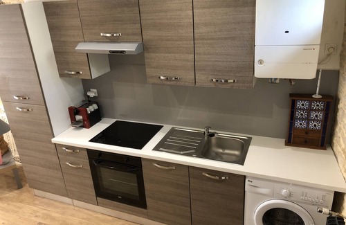 Saint-Regnobert-de-la-Cote-de-Nacre House | Les Papillons . at an alley of the sea