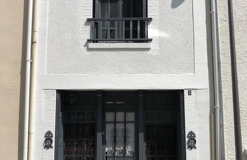 Saint-Regnobert-de-la-Cote-de-Nacre House | Les Papillons . at an alley of the sea
