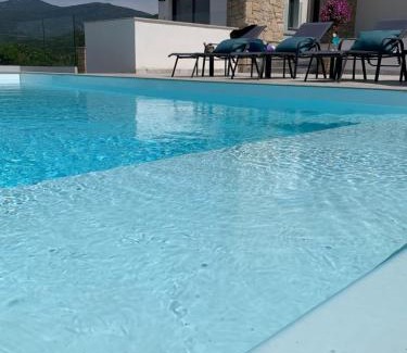 Pietrosella Villa | LES VILLAS DU DOMAINE NAPOLEON CORSICA vue mer et piscine