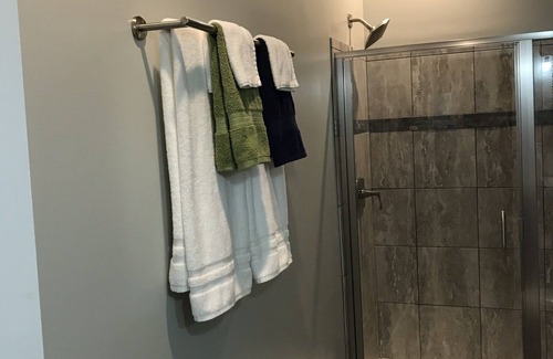 Travelers Rest House | Light and airy contemporary guest house with private deck and parking.