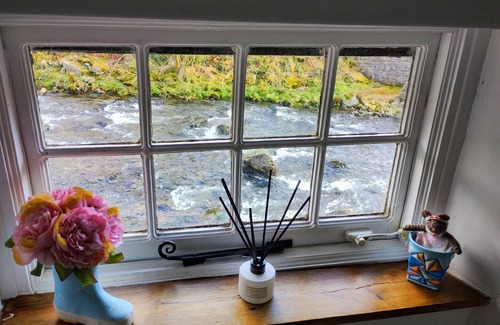 Beddgelert Cottage | Llety is in a stunning riverside location in beautiful Beddgelert.
