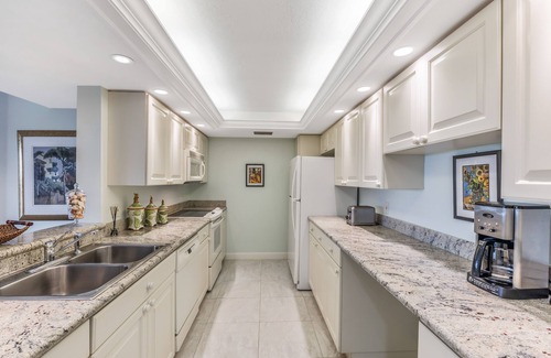 Vanderbilt Beach Condo | Location Location Location Short walk to the beach