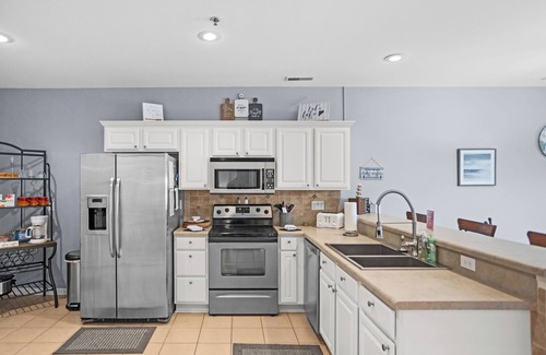Camdenton Condo | Loch Haven 138-6E - Serene Views from the Screened Deck!