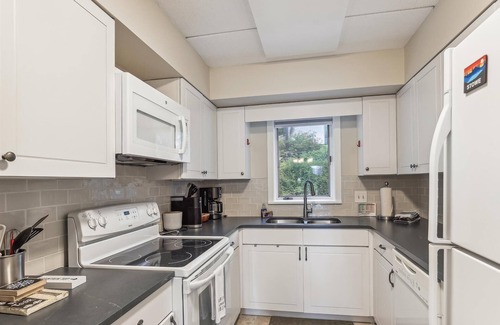 Stowe Area Condo | Lodge Condo 26: slopeside 2 br, fireplace, free ski shuttle, summer pool!