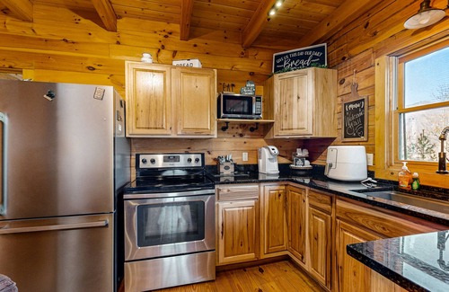 Whittier House | Lofted cabin in the trees with private pool table, washer/dryer, & full kitchen