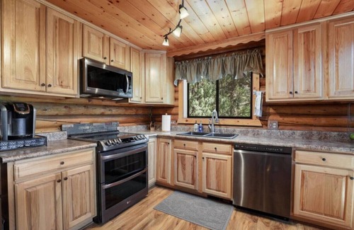Pine Cabin | Log cabin loaded with amenities and king beds