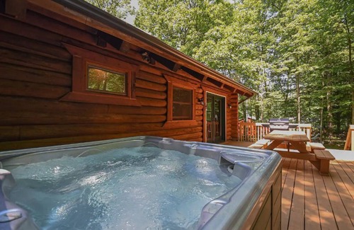 Swanton Cabin | Log Cabin Retreat w/Hot Tub, Game Room, Fire Pit