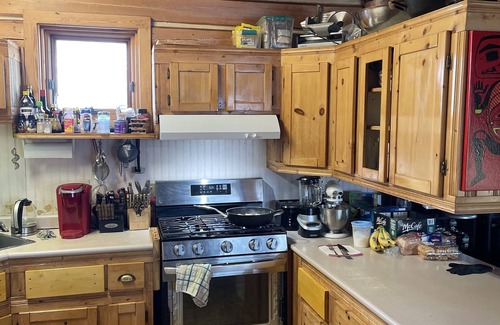 Dawson City House | Log cabin with large deck and 6 person hot tub