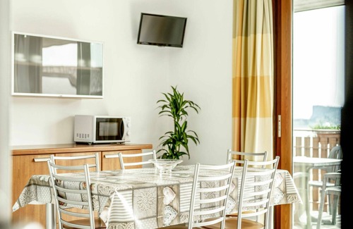 Villaggio Sanghen Apartment | Lovely apartment for 4 people with WIFI, A/C, pool, TV, terrace and pets allowed
