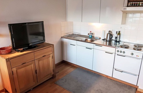 Laax Apartment | Lovely apartment for 3 guests with WIFI, pool, TV, balcony, pets allowed, panoramic view and par.