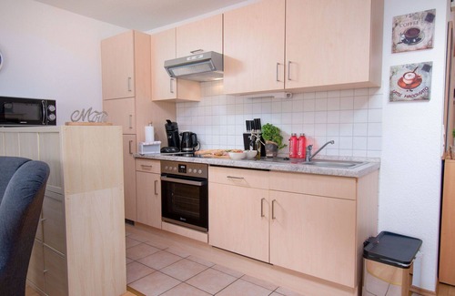Norddeich Apartment | Lovely apartment for 4 people with WIFI, TV, balcony and parking
