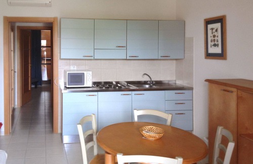 Tirrenia Apartment | Lovely apartment for 4 guests with A/C, pool, WIFI, TV, terrace and pets allowed