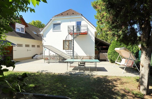 Balatonszemes Apartment | Lovely apartment for 15 people with WIFI, A/C, TV, patio, pets allowed and parking