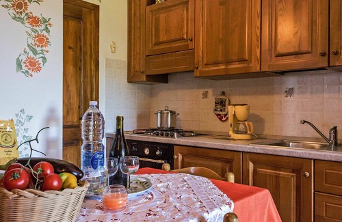 Lajatico Villa | Lovely apartment in villa for 2 guests with pool, WIFI, TV and patio