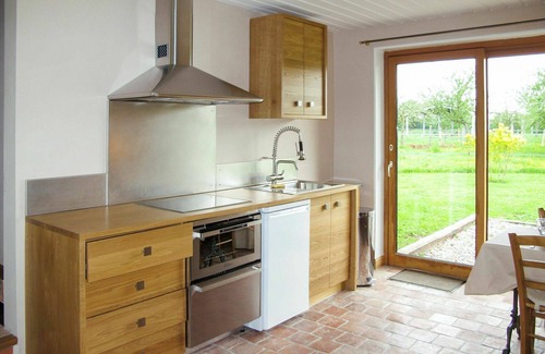 Victot - Pontfol House | Lovely apartment in villa for 3 guests with WIFI, pool, TV, patio and pets allowed