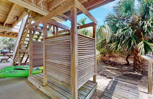 St. George Island House | Lovely Beachfront Plantation home, Pool, Screened Porch, Fireplace, 4BR/3.5BA "Orchid By The Sea"