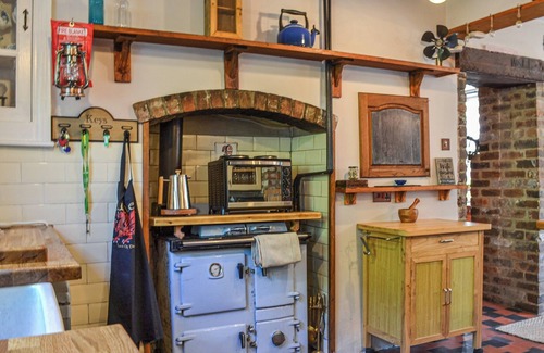 Margam Cottage | Lovely cottage with a large garden and decked area overlooking the River Taff.