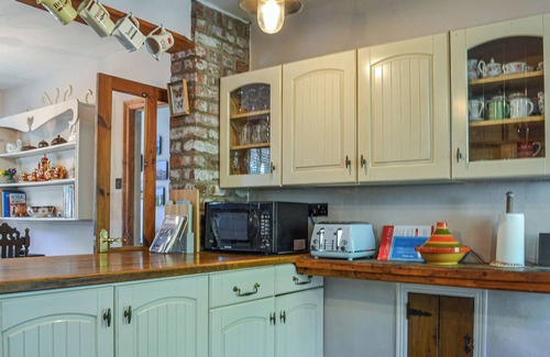 Margam Cottage | Lovely cottage with a large garden and decked area overlooking the River Taff.