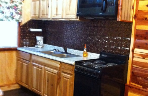 Hughes County Cabin | Lovely secluded rustic cabin within waking distance of Rocky Top Winery .