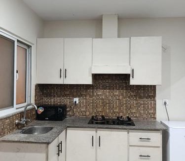 Hassan Abdal Apartment | Luxe 1 Bedroom Apartment in Doha emporium B-17, Margalla views