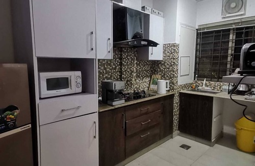 Islamabad Apartment | luxe leaf residence with Patio & Gym, luxury in the heart of capital city