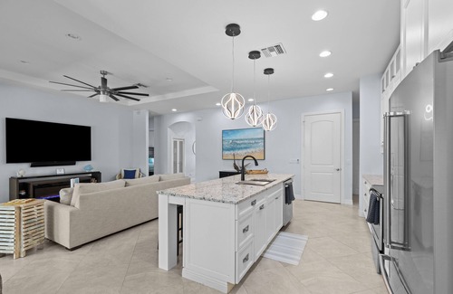 Fort Pierce House | Luxurious 4-Bedroom Pool Home -Walk to Beach & Restaurants