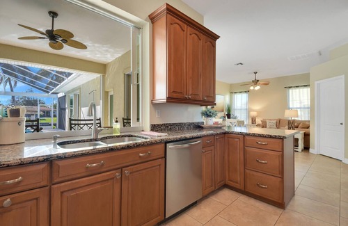 Caloosahatchee House | Luxurious 5 Star Gulf Access Canal home w boat lift, kayak lifts, pool, tiki hut