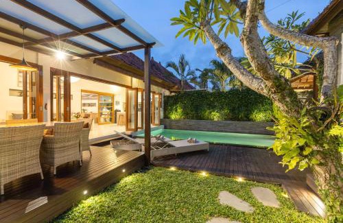 Sunset Road Villa | Luxurious and Cozy King Beds, Pool, closed living room
