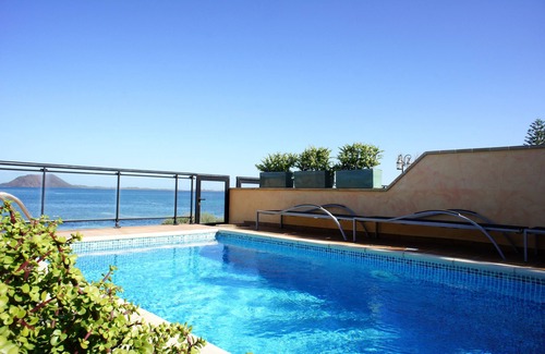 Corralejo Villa | Luxurious beachfront vacation rental home with heated salt water pool