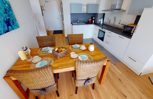 Pelzerhaken Apartment | Luxurious new-build vacation apartment for 2-4 guests with direct sea view and wallbox
