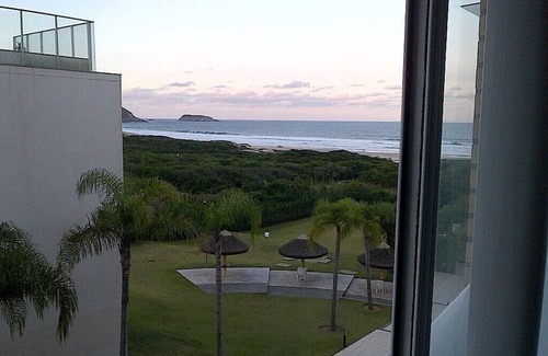 Santinho Apartment | Luxurious Sea Front Duplex with Resort structure in gated community.