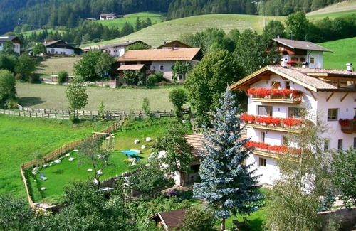 Campo di Trens Ski Chalet | Luxurious, stylish chalets at 1000 m above sea level, swimming pond, horse riding on the farm