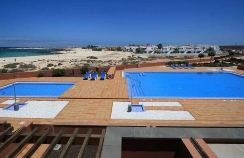 Los Lagos Apartment | Luxuriously furnished apartment first row on the sandy beach of Los Lagos + WiFi