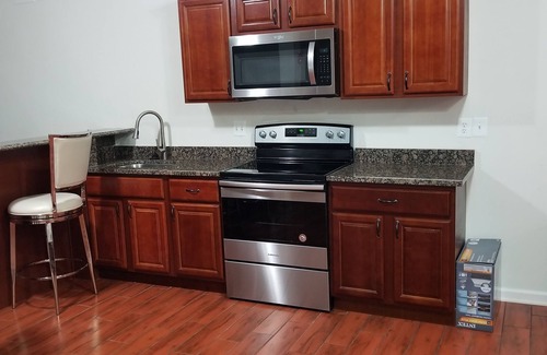 Woodmore House | Luxury 2 Bedroom Basement Apartment