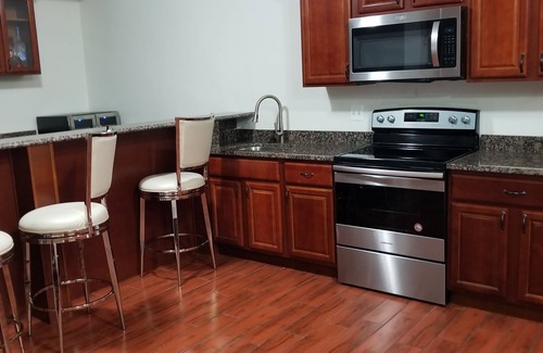 Woodmore House | Luxury 2 Bedroom Basement Apartment