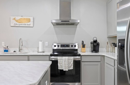 Ocean Side Village House | Luxury 3BR Townhome: Walk to Beach + Pool Access!