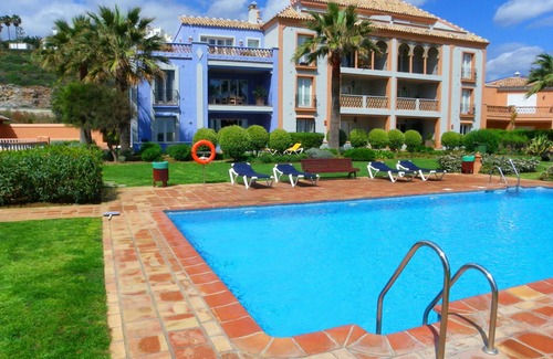 Bahia de Casares Apartment | Luxury apartment on ground floor with sea views, private garden