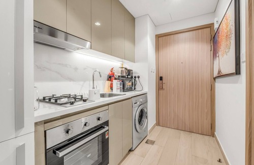 Nad Al Sheba Apartment | Luxury Apartment Pool Scenery