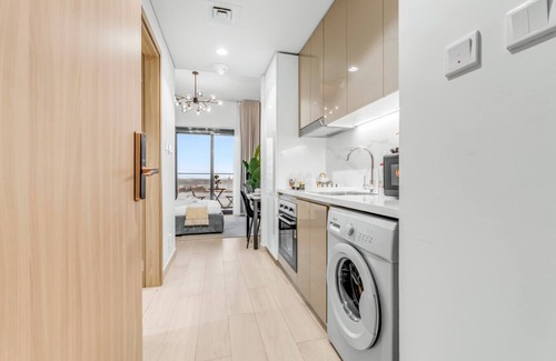Nad Al Sheba Apartment | Luxury Apartment Pool Scenery