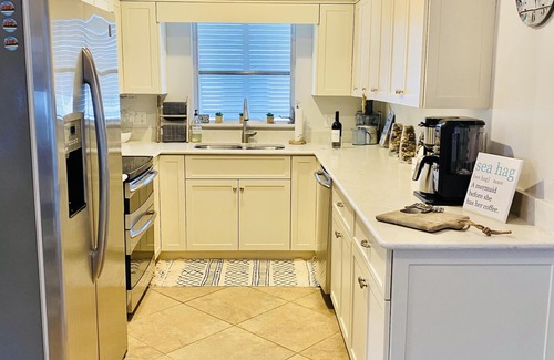 Naples Park House | Luxury Beach House Pool & Hot Tub Oasis