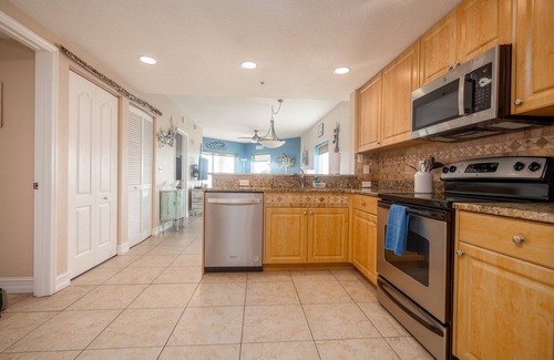Capri Isle Condo | Luxury Corner Oasis Panoramic Ocean Views