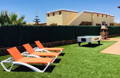 Caleta de Fuste Villa | Luxury villa, sleeps 7. Roof top overlooking golf course. Private pool.