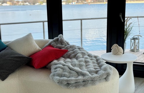Werder Boat Rental | Luxury Floating Home Shanti 2 with fireplace & lakeside sauna