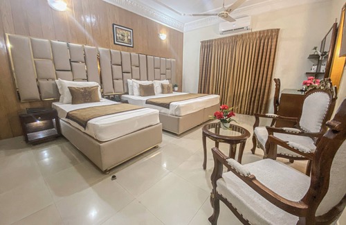 D.H.A. Bed & Breakfast | Luxury Independent 9 Bed Room Villa with attached bath and complete amenities.