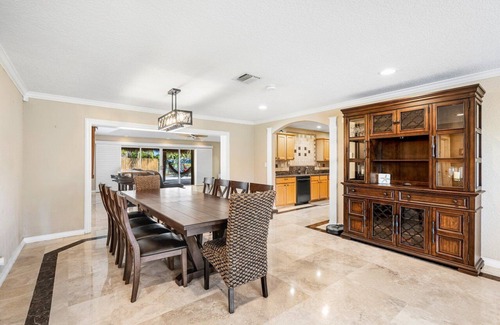 Lake Worth House | Luxury Lakefront Retreat with Heated Pool, Tiki Lounge, Dock, Gym & EV Charger