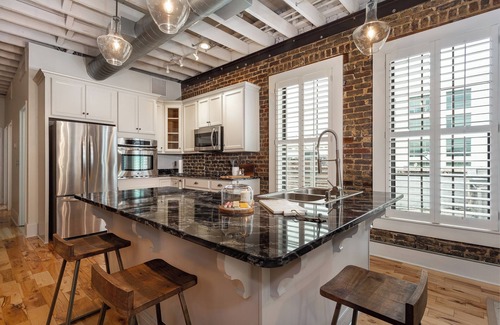 Central City Apartment | Luxury Penthouse with Private Deck and Indoor Parking