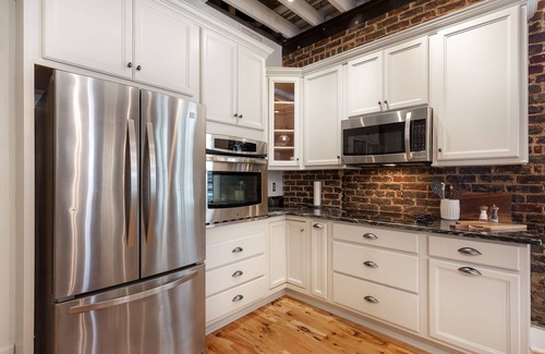 Central City Apartment | Luxury Penthouse with Private Deck and Indoor Parking