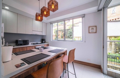 Granada Apartment | Luxury Poolside Retreat in Cali | Steps from Granada's Best Bars & Gastronomy