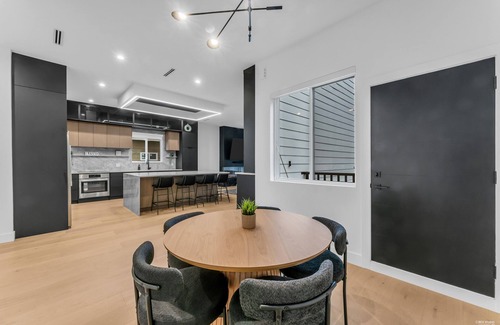 Surrey House | Luxury River-View Home w/Chef’s Kitchen Smart Tech Parking Sleeps 15!